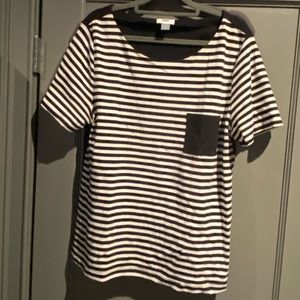 Black and white striped tshirt with black accent pocket. Size large
